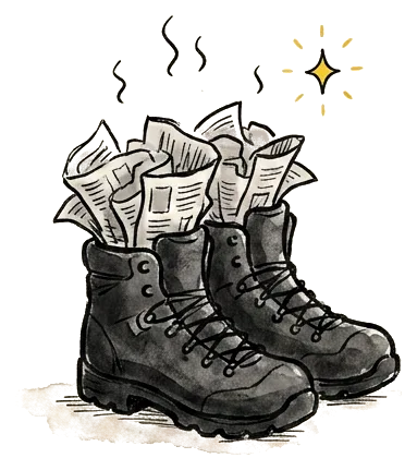 A pair of hiking boots stuffed with crumpled newspaper, drying